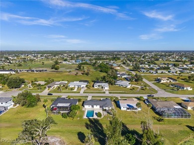 Beautifully updated pool home located on a golf course, offering on Rotonda Golf and Country Club The Hills Course in Florida - for sale on GolfHomes.com, golf home, golf lot