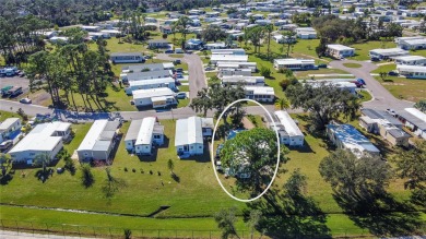 CHARMING, UNIQUE, MOBILE HOME IN FABULOUS HOLIDAY PARK, A on Sabal Trace Golf and Country Club in Florida - for sale on GolfHomes.com, golf home, golf lot