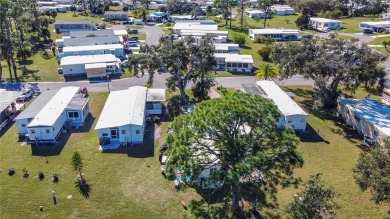 CHARMING, UNIQUE, MOBILE HOME IN FABULOUS HOLIDAY PARK, A on Sabal Trace Golf and Country Club in Florida - for sale on GolfHomes.com, golf home, golf lot