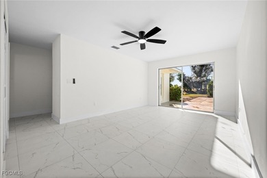 Beautifully updated pool home located on a golf course, offering on Rotonda Golf and Country Club The Hills Course in Florida - for sale on GolfHomes.com, golf home, golf lot