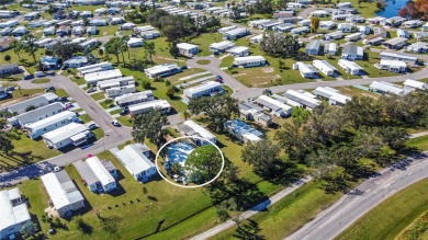 CHARMING, UNIQUE, MOBILE HOME IN FABULOUS HOLIDAY PARK, A on Sabal Trace Golf and Country Club in Florida - for sale on GolfHomes.com, golf home, golf lot