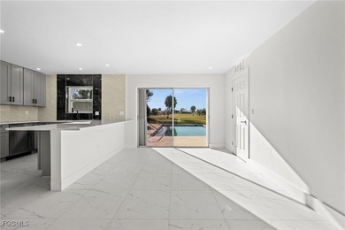 Beautifully updated pool home located on a golf course, offering on Rotonda Golf and Country Club The Hills Course in Florida - for sale on GolfHomes.com, golf home, golf lot