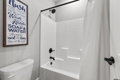 This inviting home welcomes you the moment you step through the on Hide-A-Way Lake Golf Course in Texas - for sale on GolfHomes.com, golf home, golf lot