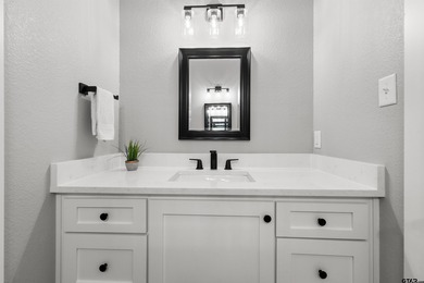 This inviting home welcomes you the moment you step through the on Hide-A-Way Lake Golf Course in Texas - for sale on GolfHomes.com, golf home, golf lot