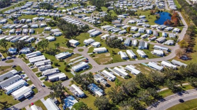CHARMING, UNIQUE, MOBILE HOME IN FABULOUS HOLIDAY PARK, A on Sabal Trace Golf and Country Club in Florida - for sale on GolfHomes.com, golf home, golf lot