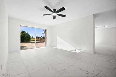 Beautifully updated pool home located on a golf course, offering on Rotonda Golf and Country Club The Hills Course in Florida - for sale on GolfHomes.com, golf home, golf lot