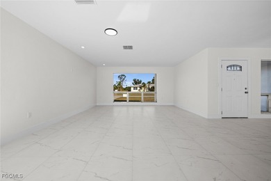 Beautifully updated pool home located on a golf course, offering on Rotonda Golf and Country Club The Hills Course in Florida - for sale on GolfHomes.com, golf home, golf lot