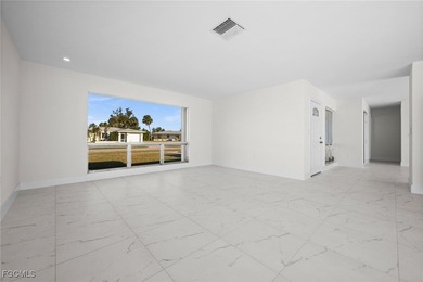 Beautifully updated pool home located on a golf course, offering on Rotonda Golf and Country Club The Hills Course in Florida - for sale on GolfHomes.com, golf home, golf lot