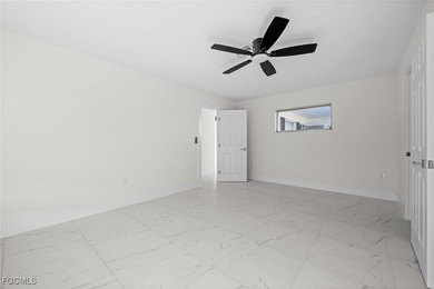 Beautifully updated pool home located on a golf course, offering on Rotonda Golf and Country Club The Hills Course in Florida - for sale on GolfHomes.com, golf home, golf lot