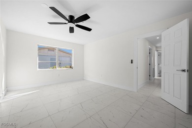 Beautifully updated pool home located on a golf course, offering on Rotonda Golf and Country Club The Hills Course in Florida - for sale on GolfHomes.com, golf home, golf lot