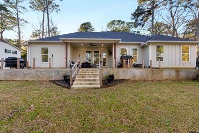 This inviting home welcomes you the moment you step through the on Hide-A-Way Lake Golf Course in Texas - for sale on GolfHomes.com, golf home, golf lot