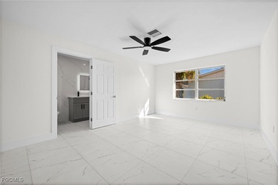 Beautifully updated pool home located on a golf course, offering on Rotonda Golf and Country Club The Hills Course in Florida - for sale on GolfHomes.com, golf home, golf lot