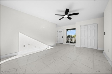 Beautifully updated pool home located on a golf course, offering on Rotonda Golf and Country Club The Hills Course in Florida - for sale on GolfHomes.com, golf home, golf lot