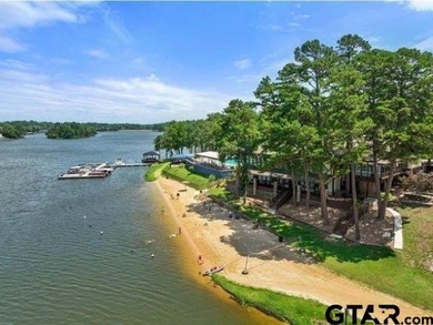 This inviting home welcomes you the moment you step through the on Hide-A-Way Lake Golf Course in Texas - for sale on GolfHomes.com, golf home, golf lot