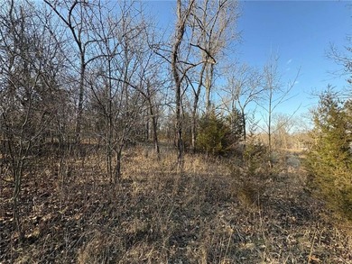 Great opportunity to own a building lot in the gated community on Linn Valley Lakes - Deer Trace Golf Course in Kansas - for sale on GolfHomes.com, golf home, golf lot