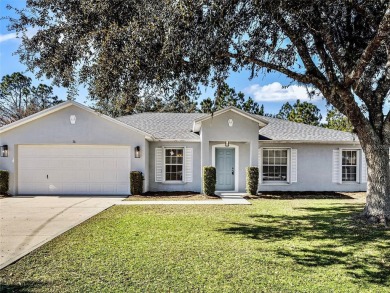 Better Than New! 3 Bed, 2 Bath Home with Screened Porch and on The Grand Club Cypress Course in Florida - for sale on GolfHomes.com, golf home, golf lot