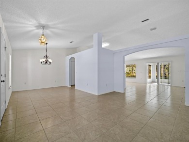 Better Than New! 3 Bed, 2 Bath Home with Screened Porch and on The Grand Club Cypress Course in Florida - for sale on GolfHomes.com, golf home, golf lot