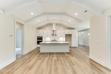 This brand new Riptide home with stunning setting and finishes on Sea Trail Golf Resort in North Carolina - for sale on GolfHomes.com, golf home, golf lot