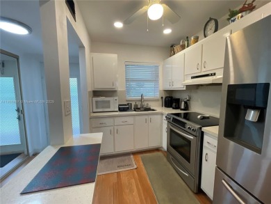 Enjoy serene lake views and resort-style living in this on Sunrise Lakes Phase III in Florida - for sale on GolfHomes.com, golf home, golf lot