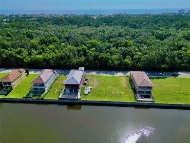 Build your Florida waterfront dream home on this Premier deep on Hammock Dunes Club in Florida - for sale on GolfHomes.com, golf home, golf lot