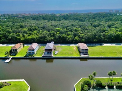 Build your Florida waterfront dream home on this Premier deep on Hammock Dunes Club in Florida - for sale on GolfHomes.com, golf home, golf lot