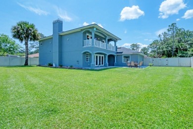 Lovely 2-story home on 1/4 acre in the Pine Lakes area of Palm on The Grand Club - Pine Lakes Course in Florida - for sale on GolfHomes.com, golf home, golf lot