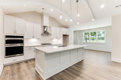 This brand new Riptide home with stunning setting and finishes on Sea Trail Golf Resort in North Carolina - for sale on GolfHomes.com, golf home, golf lot