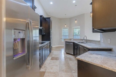 This spacious single-story home features a 2-car garage and a on Lago Vista Golf Club in Texas - for sale on GolfHomes.com, golf home, golf lot