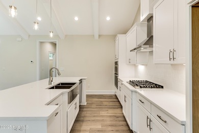 This brand new Riptide home with stunning setting and finishes on Sea Trail Golf Resort in North Carolina - for sale on GolfHomes.com, golf home, golf lot