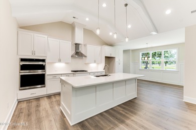 This brand new Riptide home with stunning setting and finishes on Sea Trail Golf Resort in North Carolina - for sale on GolfHomes.com, golf home, golf lot