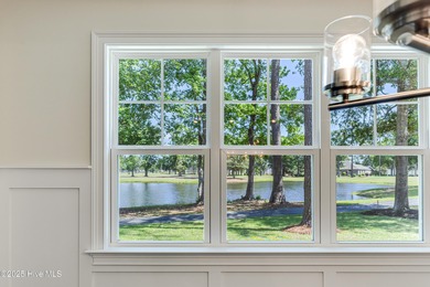 This brand new Riptide home with stunning setting and finishes on Sea Trail Golf Resort in North Carolina - for sale on GolfHomes.com, golf home, golf lot