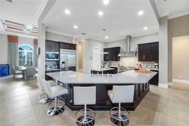 Isla Del Sol in award-winning Fiddler's Creek is like no other on The Rookery At Marco in Florida - for sale on GolfHomes.com, golf home, golf lot