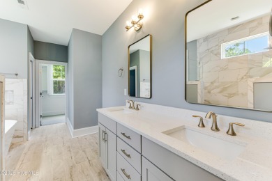 This brand new Riptide home with stunning setting and finishes on Sea Trail Golf Resort in North Carolina - for sale on GolfHomes.com, golf home, golf lot