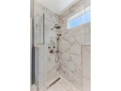 This brand new Riptide home with stunning setting and finishes on Sea Trail Golf Resort in North Carolina - for sale on GolfHomes.com, golf home, golf lot
