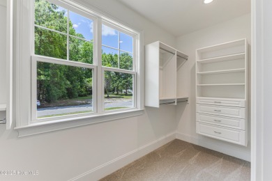 This brand new Riptide home with stunning setting and finishes on Sea Trail Golf Resort in North Carolina - for sale on GolfHomes.com, golf home, golf lot