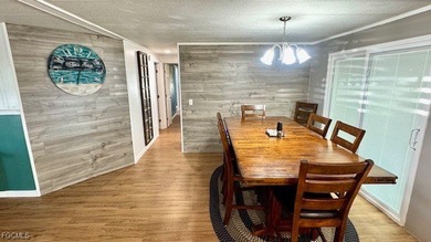 This beautifully remodeled manufactured home boasts 2 bedrooms on Riverbend Golf and Country Club in Florida - for sale on GolfHomes.com, golf home, golf lot