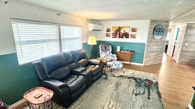 This beautifully remodeled manufactured home boasts 2 bedrooms on Riverbend Golf and Country Club in Florida - for sale on GolfHomes.com, golf home, golf lot