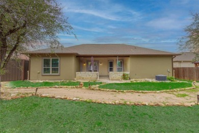 This spacious single-story home features a 2-car garage and a on Lago Vista Golf Club in Texas - for sale on GolfHomes.com, golf home, golf lot