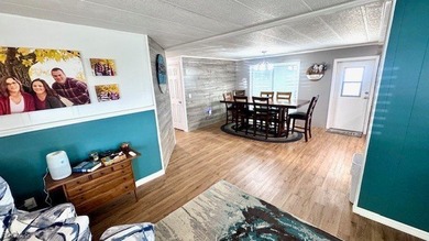 This beautifully remodeled manufactured home boasts 2 bedrooms on Riverbend Golf and Country Club in Florida - for sale on GolfHomes.com, golf home, golf lot