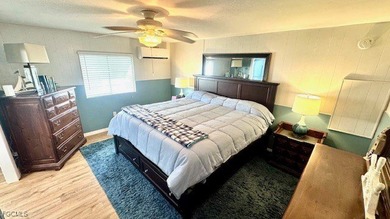 This beautifully remodeled manufactured home boasts 2 bedrooms on Riverbend Golf and Country Club in Florida - for sale on GolfHomes.com, golf home, golf lot