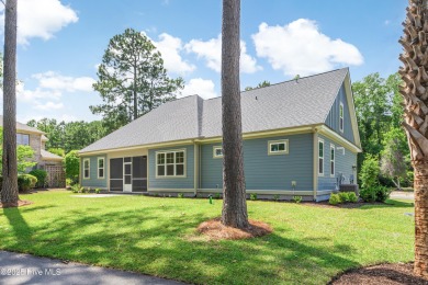 This brand new Riptide home with stunning setting and finishes on Sea Trail Golf Resort in North Carolina - for sale on GolfHomes.com, golf home, golf lot