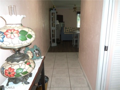 Pristine One Level renovated Condo located with beautiful  views on Hideaway Country Club in Florida - for sale on GolfHomes.com, golf home, golf lot