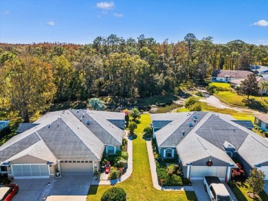 Welcome home!! Popular 55+ Villa with fantastic views of the on Summertree Golf Course in Florida - for sale on GolfHomes.com, golf home, golf lot