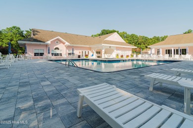This brand new Riptide home with stunning setting and finishes on Sea Trail Golf Resort in North Carolina - for sale on GolfHomes.com, golf home, golf lot