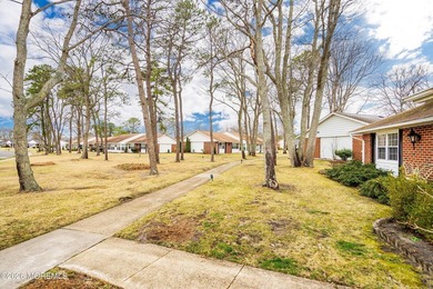 This end unit Barnett model offers a convenient location near on Leisure Village East in New Jersey - for sale on GolfHomes.com, golf home, golf lot