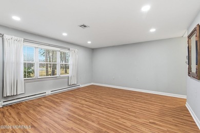 This end unit Barnett model offers a convenient location near on Leisure Village East in New Jersey - for sale on GolfHomes.com, golf home, golf lot