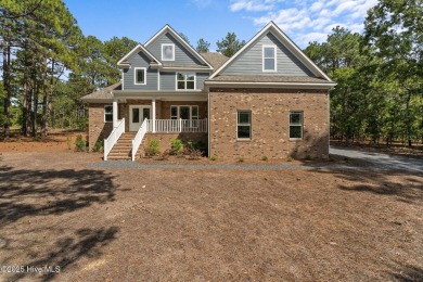 This newly constructed home is located in the community of Seven on Beacon Ridge Golf and Country Club in North Carolina - for sale on GolfHomes.com, golf home, golf lot