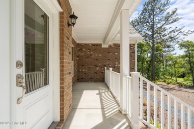 This newly constructed home is located in the community of Seven on Beacon Ridge Golf and Country Club in North Carolina - for sale on GolfHomes.com, golf home, golf lot