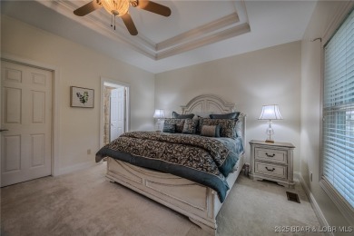 Enjoy maintenance-free living and tru main-level comfort- on The Club At Porto Cima in Missouri - for sale on GolfHomes.com, golf home, golf lot