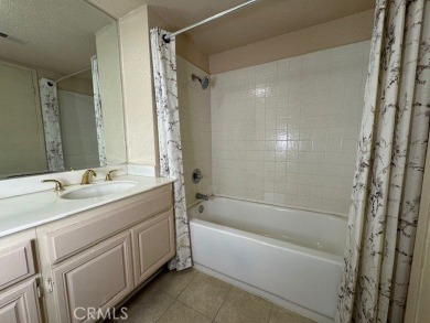 This beautifully appointed 2-bedroom, 2-bathroom condo offers a on Mission Viejo Country Club in California - for sale on GolfHomes.com, golf home, golf lot